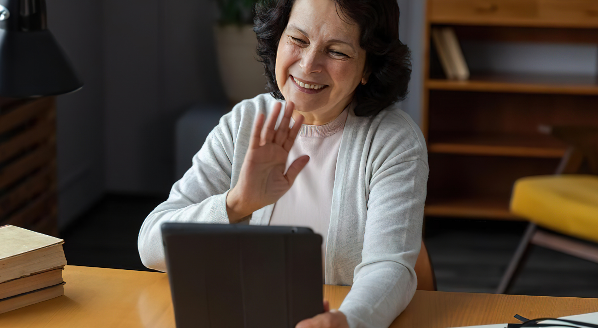 female counselor holding tablet