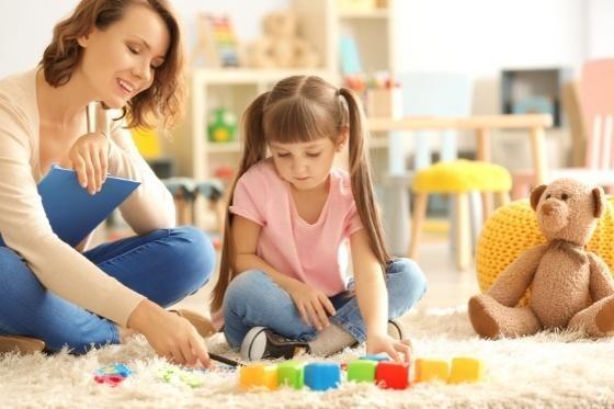 Woman and child in play room