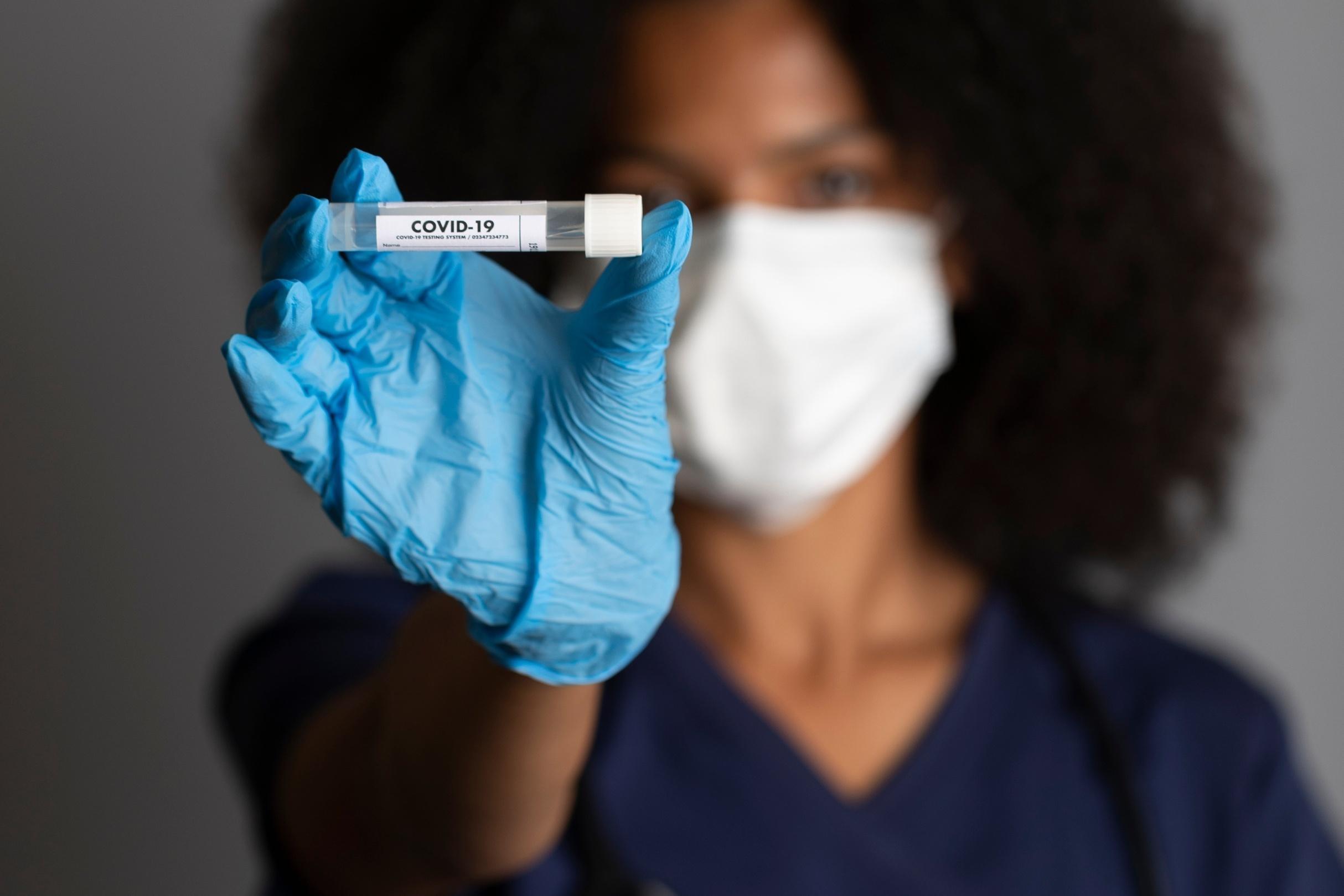 Nurse holding vaccine