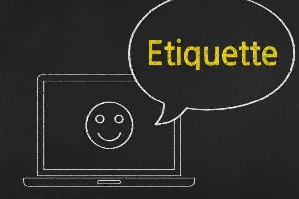 Image of Telehealth Practitioner’s computer with smiley face claiming etiquette