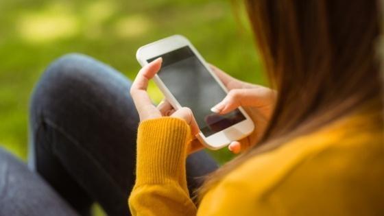 Female texting on her cellphone